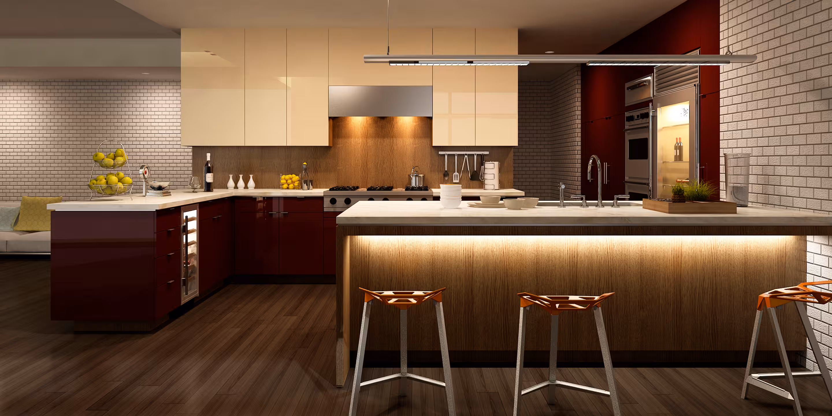 Modern kitchen with cream upper cabinets, dark red lower cabinets, island with stools and hanging light.